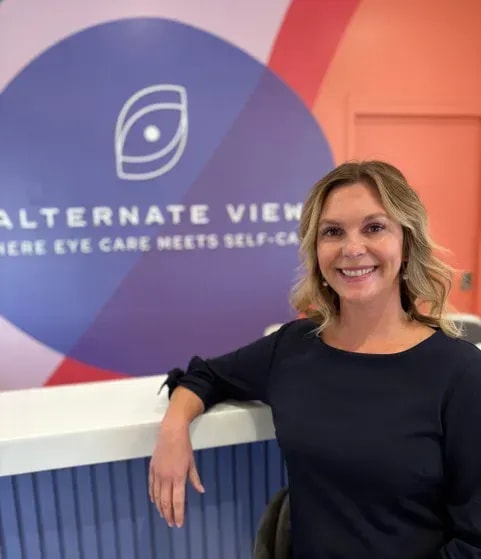 Liz Jourdan, Aesthetic Nurse Practitioner, smiles at Alternate View in Carmel City Center